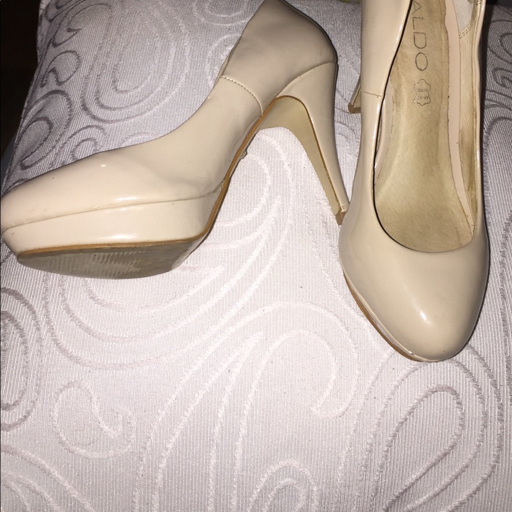 Nude pumps.